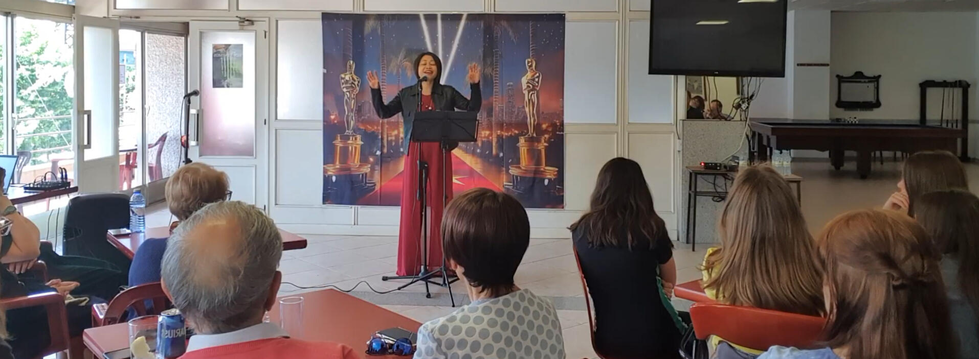 Concert performance: "Defying Gravity." Singing is harder than public speaking—there's nowhere to hide. Presence means stepping into vulnerability and commanding it.